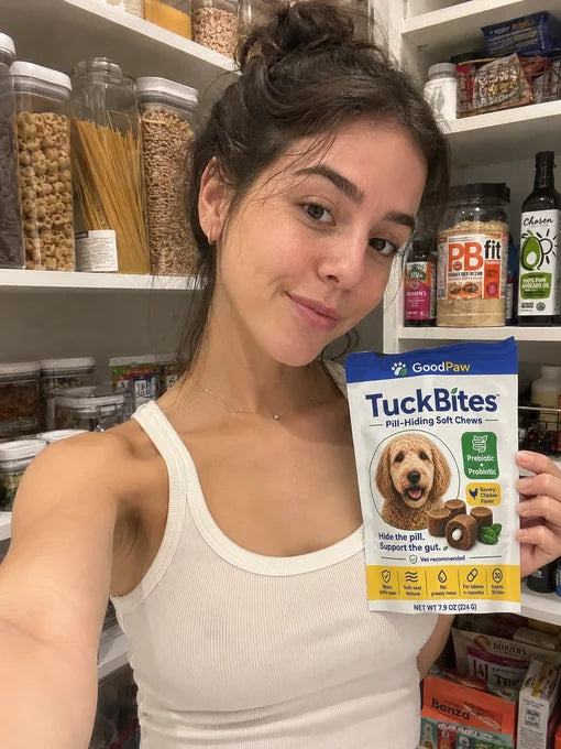 Megan holding a GoodPaw TuckBites pouch