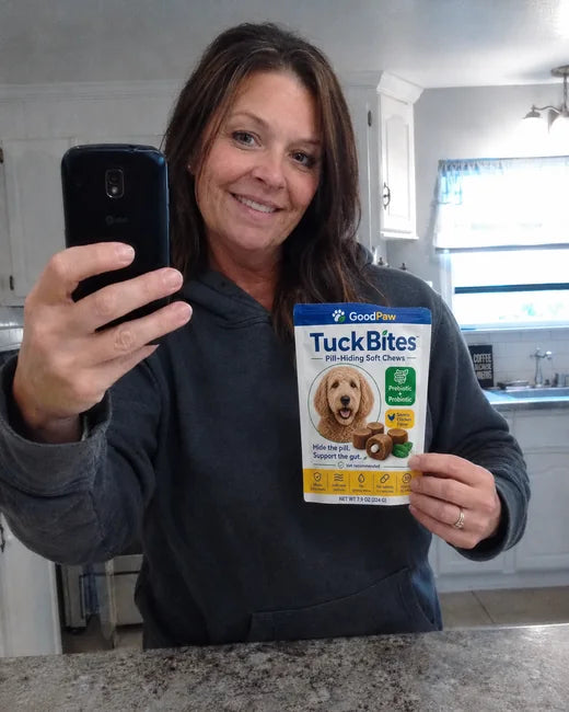 Jennifer holding a GoodPaw TuckBites pouch